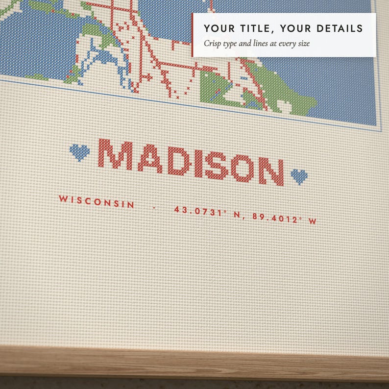 Close-up of the personalized title and details on the Cross-Stitch City Map print