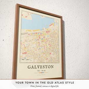 Three-quarter view of the framed Vintage Fire Atlas Map poster on a white plaster wall
