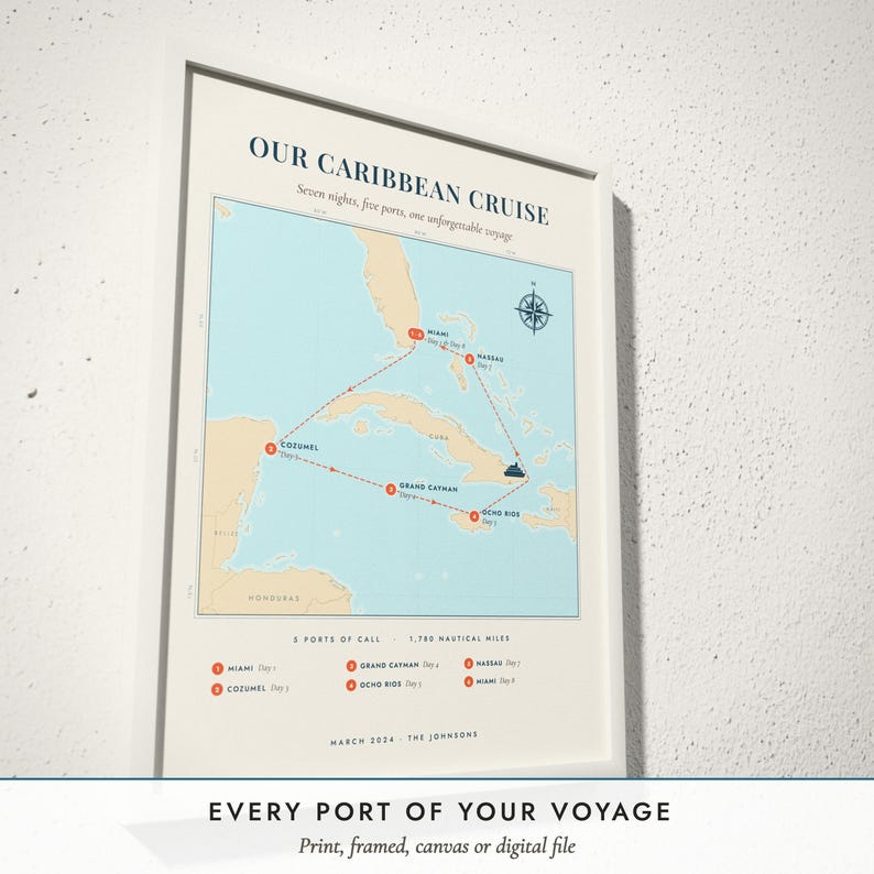 Three-quarter view of the framed Cruise Route Map poster on a white plaster wall