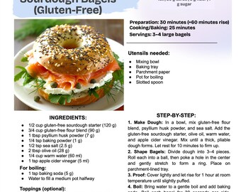 May include: A gluten-free sourdough bagel sandwich with smoked salmon, cream cheese, capers, and arugula on a white plate. The bagel is topped with sesame seeds and poppy seeds. Recipe instructions are included.