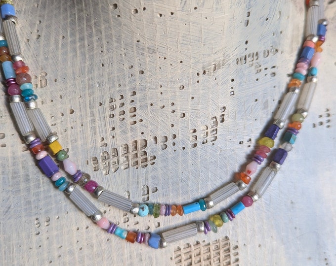 Semaphore: Long delicate strand of antique Venetian gooseberry trade beads with tiny bright gemstone punctuation