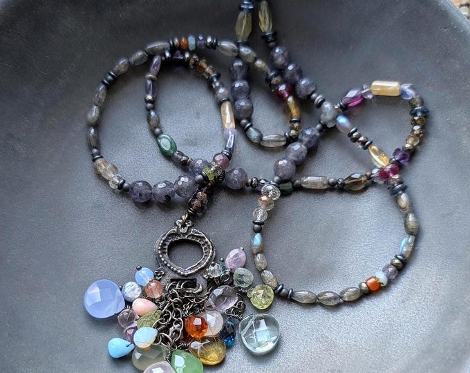 Cornucopia of gems: Luxe dancing gemstone focal on a strand of multicolored stones