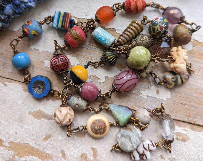 The Verses of Memory: Miscellany strand of linked art beads- each different