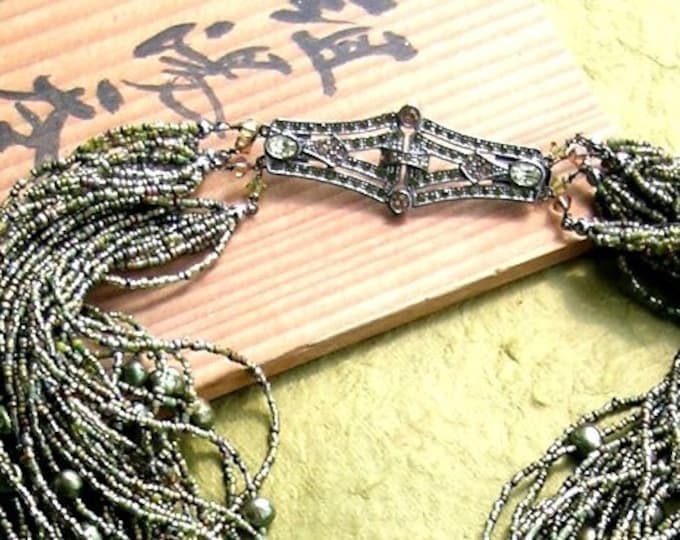 EXULANSIS STORY - Luxe Dragon Focal Multistrand collarpiece