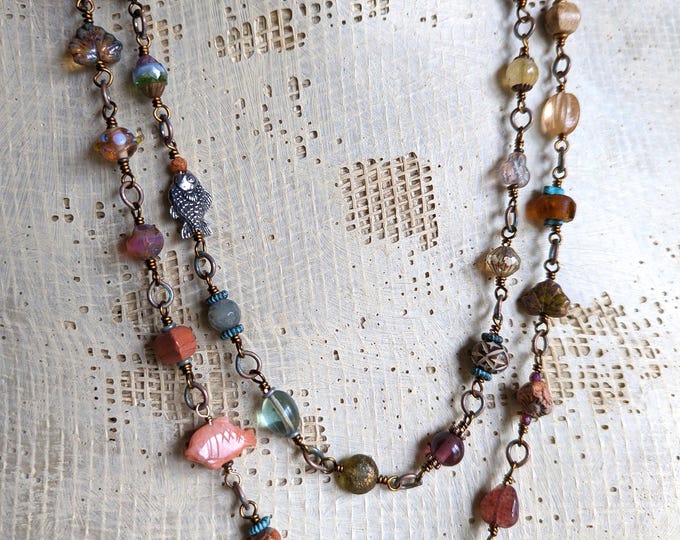 Winter Gluhwein: Miscellany strand with links of unique & different beads