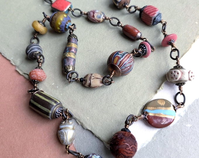 Unique Storyteller strand - "Kheprw" - whimsical all-different beaded links necklace