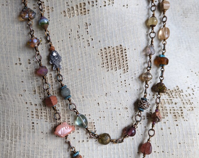 Winter Gluhwein: Miscellany strand with links of unique & different beads