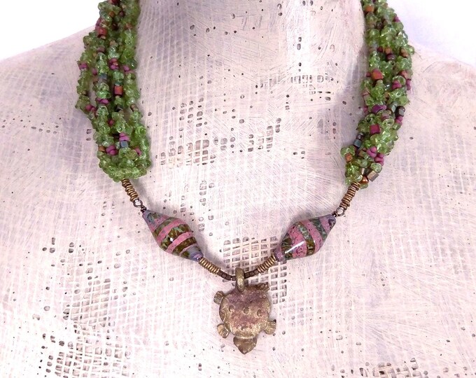 WhoShowsHisHeadNot: African brass gold weight talisman with multiple strands of peridot and artisan bicones