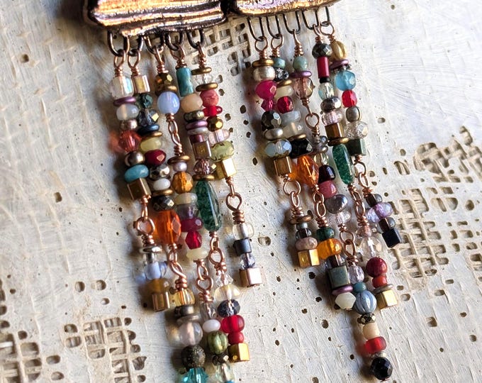 Tiny dancing gemstones and glass earrings on copper glazed ceramic arches: "Glints of Sunset"