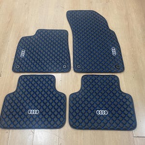 Alfombrillas de piel para Audi Q7 (2017-2024), diseño personalizado, logotipo bordado personalizado y patrón personalizado para tu vehículo.