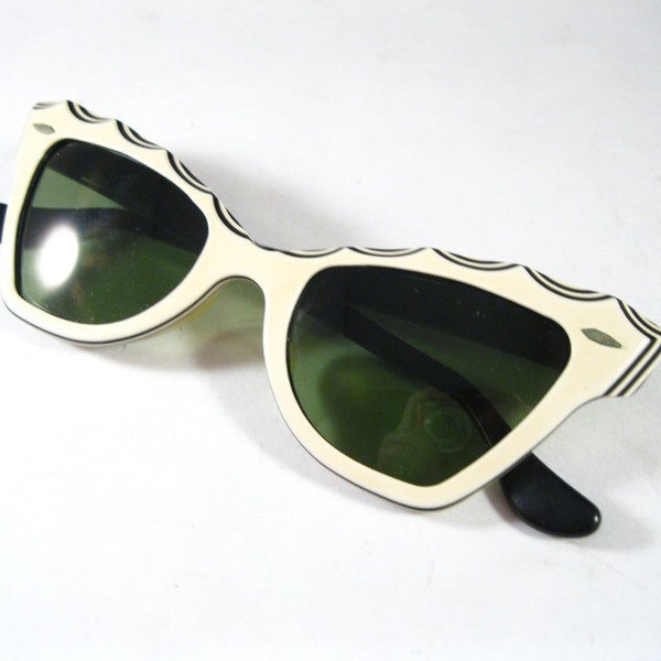 Ray-Ban vintage Zanzibar cat eye sunglasses. black and white striped layered w/ green tinted non-prescription lenses.