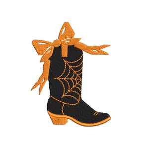 Puede incluir: Bota vaquera negra con un lazo naranja y un dise&ntilde;o de telara&ntilde;a.