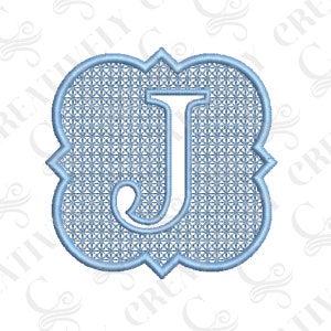 May include: A light blue embroidered letter J in a decorative frame with a grid pattern.