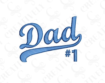 May include: Blue embroidered design that says "Dad #1" in a cursive font.