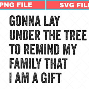 May include: Text-based graphic with the words "GONNA LAY UNDER THE TREE TO REMIND MY FAMILY THAT I AM A GIFT" in a bold, black font. The text is centered on a white background, with a red and blue banner at the top.