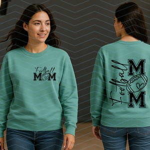 May include: A teal sweatshirt with the text "Football Mom" in black script and block letters, with a football graphic. The back of the sweatshirt also features the text "Football Mom" in a similar design.