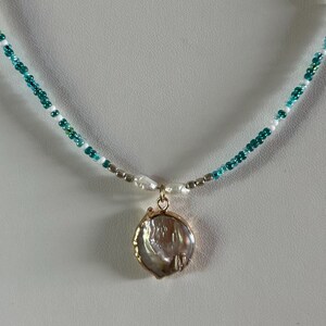 Natural pearl pendant necklace