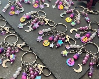 Cosmic Starsign Bag Charm - Decorative Zodiac Symbol, Purple Beads, Stars, Moons - Silver Tone Multi Trinket Keyclip - Boho Purse Accessory