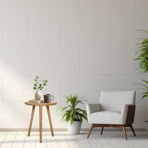 May include: A modern living room scene featuring a white armchair with wooden accents, a small round wooden side table, and potted green plants. A vase with greenery and a mug sit on the table. The walls are white.