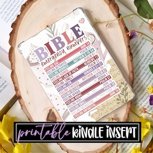 May include: A Kindle insert with a floral design and the words "BIBLE emergency numbers." The insert lists Bible verses for various emotions, such as feeling sad, betrayed, or worried. The text "printable kindle insert" is at the bottom.