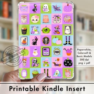 May include: A rectangular Kindle insert featuring a grid of colorful squares with Halloween-themed illustrations including ghosts, pumpkins, skeletons, cats, and bats in shades of purple, pink, green, and blue. Text reads Lolie Jude Co.