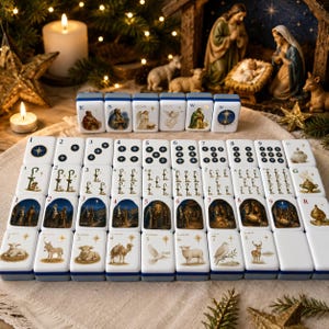 May include: A set of white rectangular tiles featuring a Nativity theme, including illustrations of the Holy Family, shepherds, animals, and stars. The tiles are arranged in rows, with some marked with numbers, letters, and directional symbols.