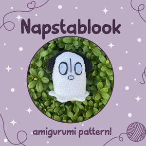 May include: A white amigurumi ghost with black earmuffs and blue eyes, set against a backdrop of green foliage. The text "Napstablook" is above the ghost, and "amigurumi pattern!" is below.