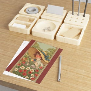 Cartoline d'epoca con motivi floreali, biglietti d'auguri botanici, articoli di cancelleria da collezione, stampe artistiche per tutte le occasioni, idee regalo