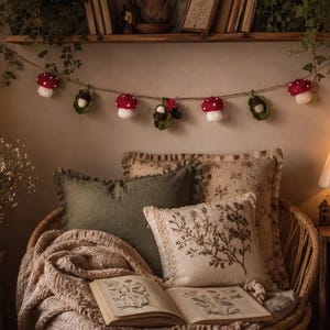 May include: A comfortable reading corner with a woven chair, cushions, and a soft throw. A garland of red and white mushroom decorations hangs above the chair. A lamp and a small table with a rabbit figurine add to the warm atmosphere.