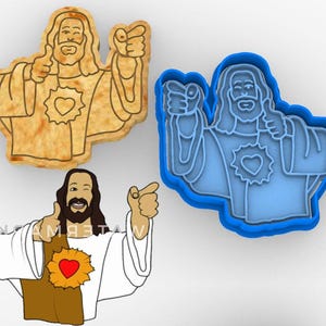 May include: An image featuring a cookie and a cookie cutter in the shape of a cartoon figure with long hair, a beard, and a heart on the chest. The cookie is golden brown, the cutter is blue, and the cartoon has a thumbs up and is pointing.