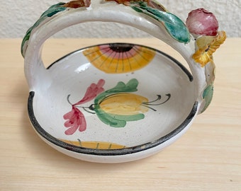 Vintage signed Italian Candy Dish of hand painted ceramic flower design and embellished handle that has a few chips at the base. Very sweet!