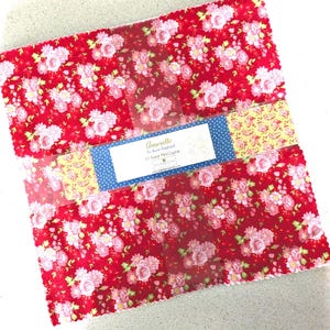 May include: A white ceramic mug with a black handle and the text "But First, Coffee" in a handwritten style. The mug is on a white surface. The mug is approximately 4 inches tall.