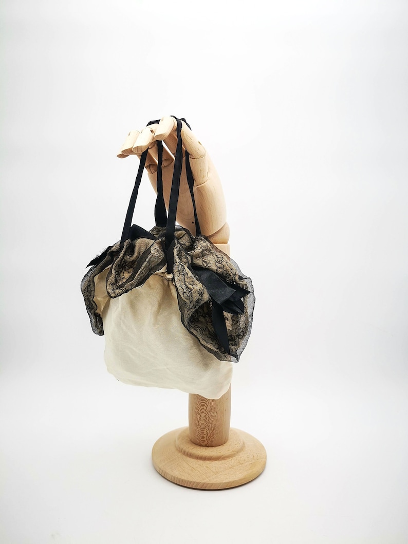 Antique French drawsting bag / purse in pale beige silk with net lace & black silk chiffon, black silk ribbon bows ornaments, flappers' era