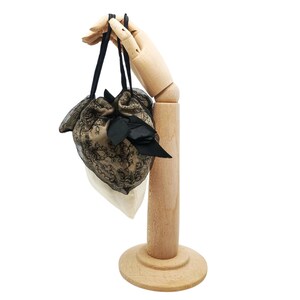 Antique French drawsting bag / purse in pale beige silk with net lace & black silk chiffon, black silk ribbon bows ornaments, flappers' era