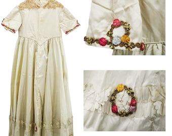 Antique Italian gown for young girl, light beige satin gown dating to early Victorian era ca 1840, with ribbon work rococò rosettes garlands