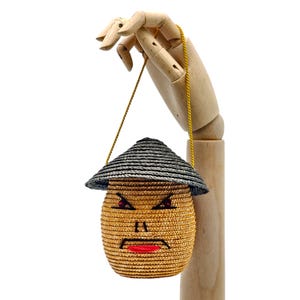 1940s French figural straw handbag with Asian face motif