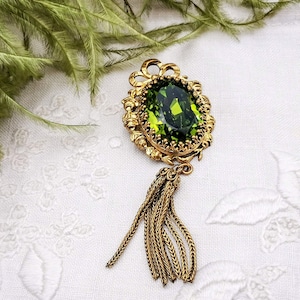 Antique French oval pendant, gold color frame medallion pendant with green rhinestone, roses garlands, bow & tassel, vintage medallion