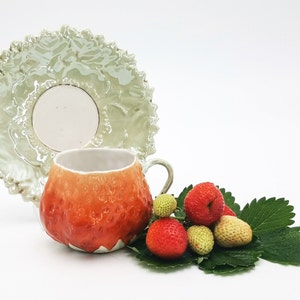 Antique French barbotine strawberry cup and saucer, early 1900s porcelain tea coffee cup with relief decor and pearly finish