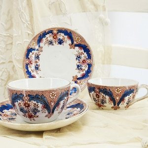 Antique French ironstone tea cups & saucers, multicolor transfer decor with flowers in blue, brown and pink Sarreguemines et Digoin