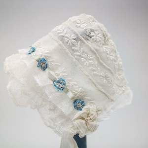 Antique French baby bonnet in tulle net lace, with light blue rococò silk ribbon work rosettes & cockades, collectable antique baby bonnet