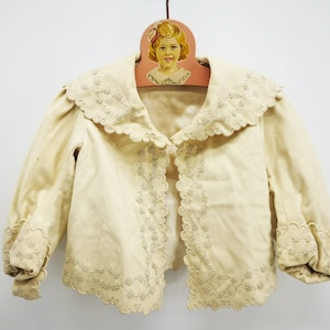 Antique French jacket for small child, in pale beige wool cloth, with large collar, scalloped edges & embroideries