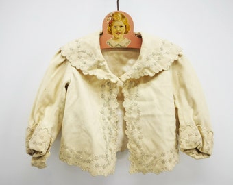 Antique French jacket for small child, in pale beige wool cloth, with large collar, scalloped edges & embroideries