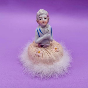Antique swan&#39;s down feather powder puff, porcelain handle featuring a Marie Antoinette style lady, vintage figural half doll top powder puff