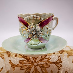 Antique pearled green & purple tea cup and saucer, Art Nouveau era German porcelain, raised flowers and gildings, Jlmenau 1777 manufacture?