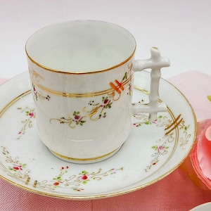 Antique French porcelain coffee cup and saucer, hand painted decor with tiny pink roses and gildings, unsigned, Vieux Paris cup & saucer