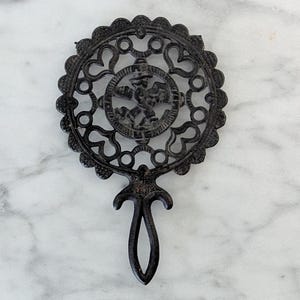 Vintage Cast Iron Trivet/Amish Boy Walking Trivet/Rustic Decor/Country Kitchen/Farmhouse Decor/Vintage Decor