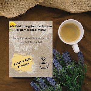 May include: A book titled "ADHD Morning Routine System for Homeschool Moms" with the text "Morning routine system + printable toolkit" and "RESET & RISE 47 Pages." A white mug of coffee and lavender sprigs are on a brown surface.