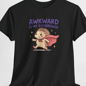 Funny Hedgehog Shirt – "Awkward Is My Superpower" – Quirky Superhero Animal Tee – Cute and Clumsy Gift – Cartoon Introvert T-Shirt