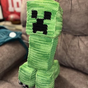 A crochet pattern to make a pixilated creep