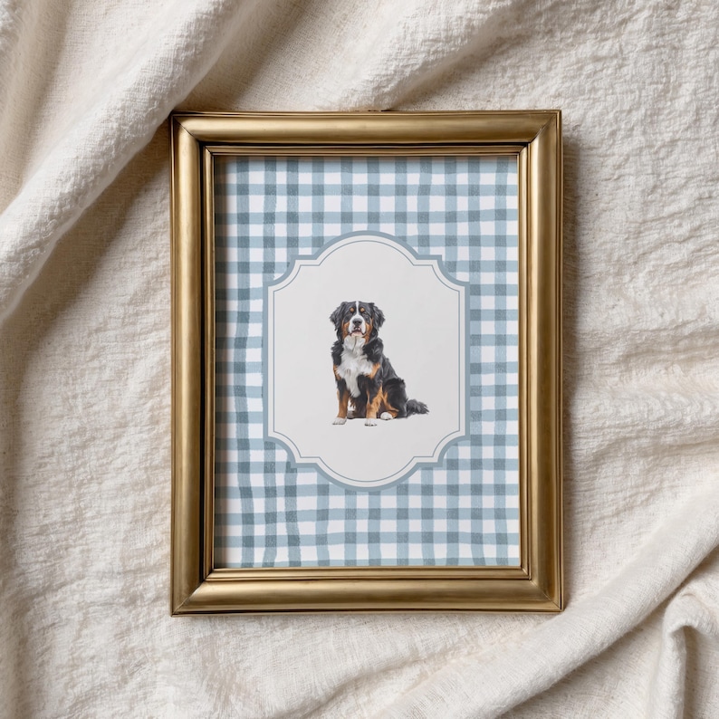 a framed picture of a dog sitting on a checkered background.